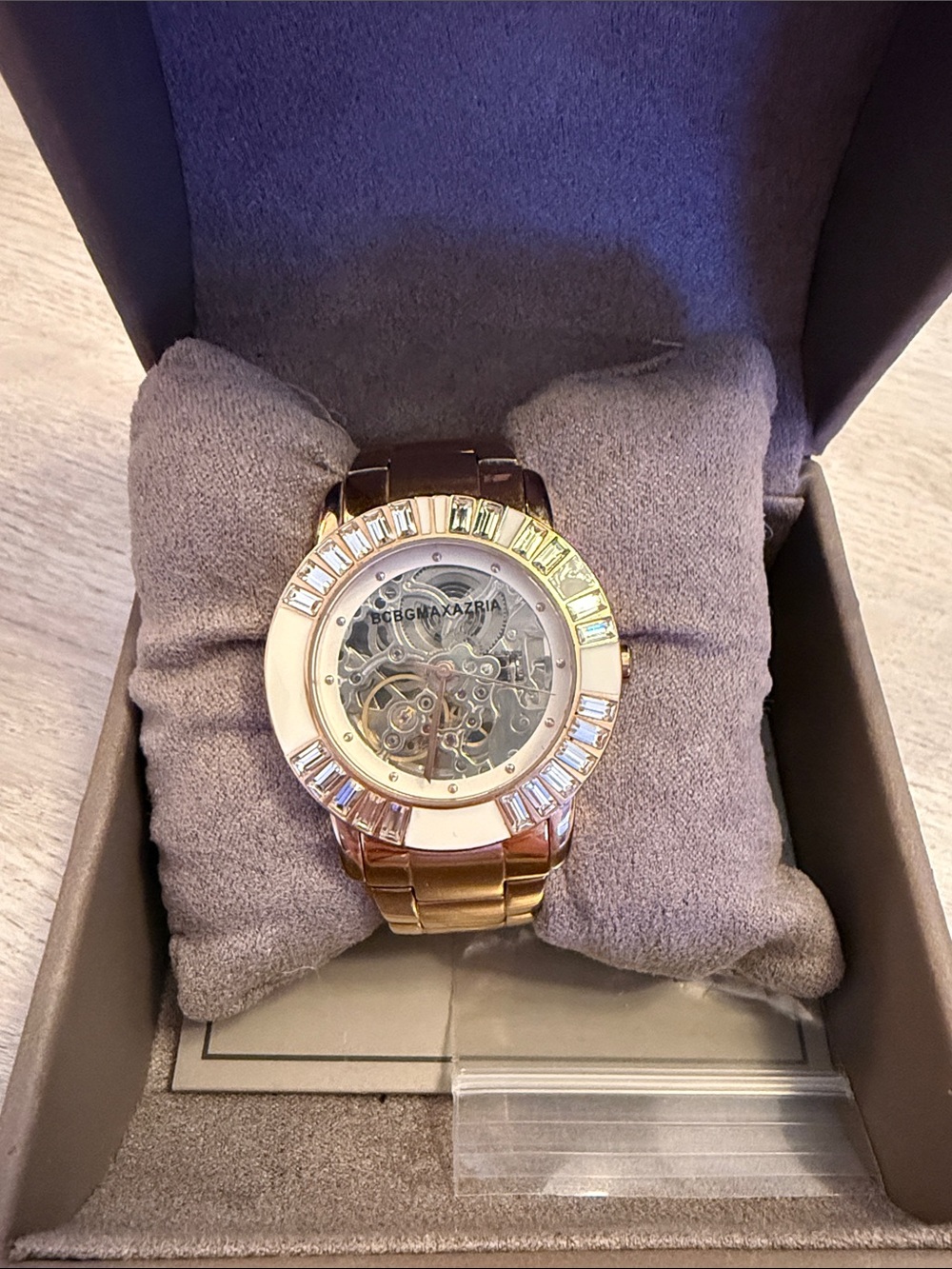 BCBGMaxAzria Rose Gold Skeleton Watch with Crystal Accents